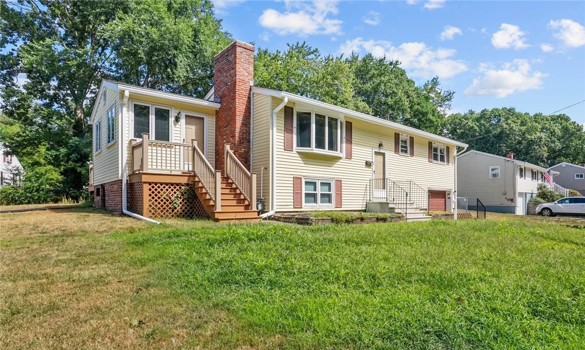 44 Morin Street Woonsocket, RI 02895 - Photo 2 of 36 Freshly seeded front yard, new 50 year roof
