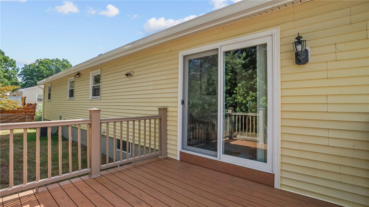 44 Morin Street Woonsocket, RI 02895 - Photo 26 of 36 Composite and vinyl decking on front and back of Florida room
