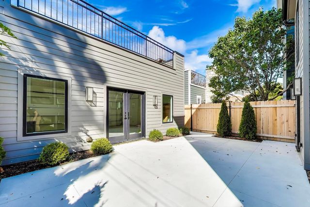 a view of outdoor space and front view of a building