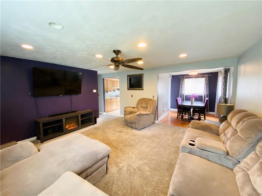 543 Grove Road Verona, PA 15147 - Photo 3 of 24 Living room, dining room and kitchen as viewed from the front window.