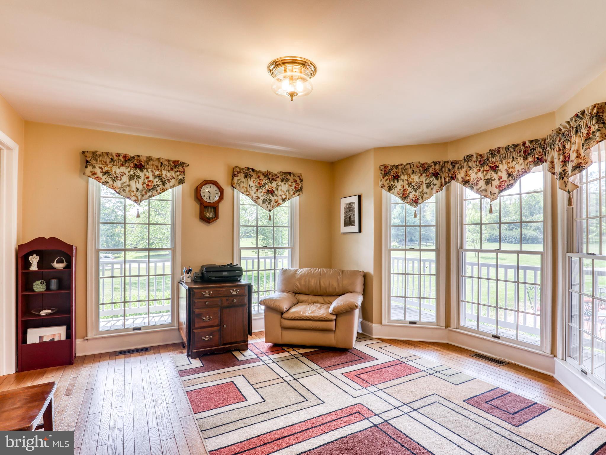 3615 Apple Pie Ridge Road Winchester, VA 22603 - Photo 20 of 47 Formal living room with lots of windows