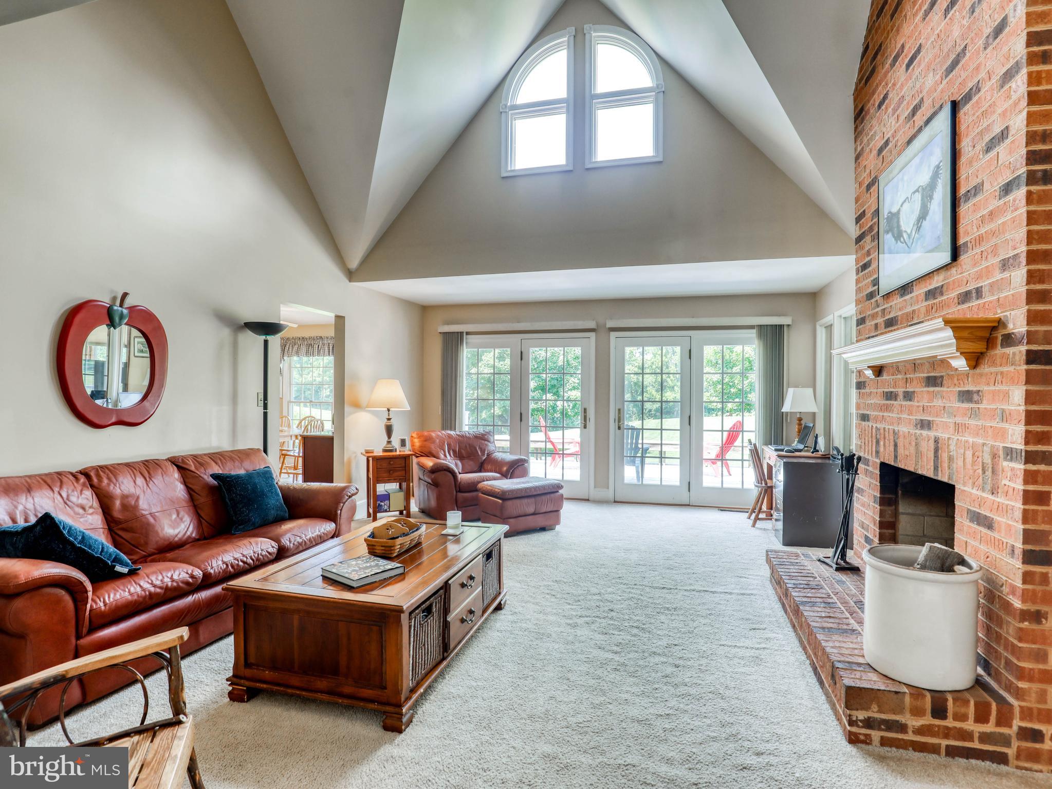 3615 Apple Pie Ridge Road Winchester, VA 22603 - Photo 22 of 47 Family room w/brick hearth and woodburning FP