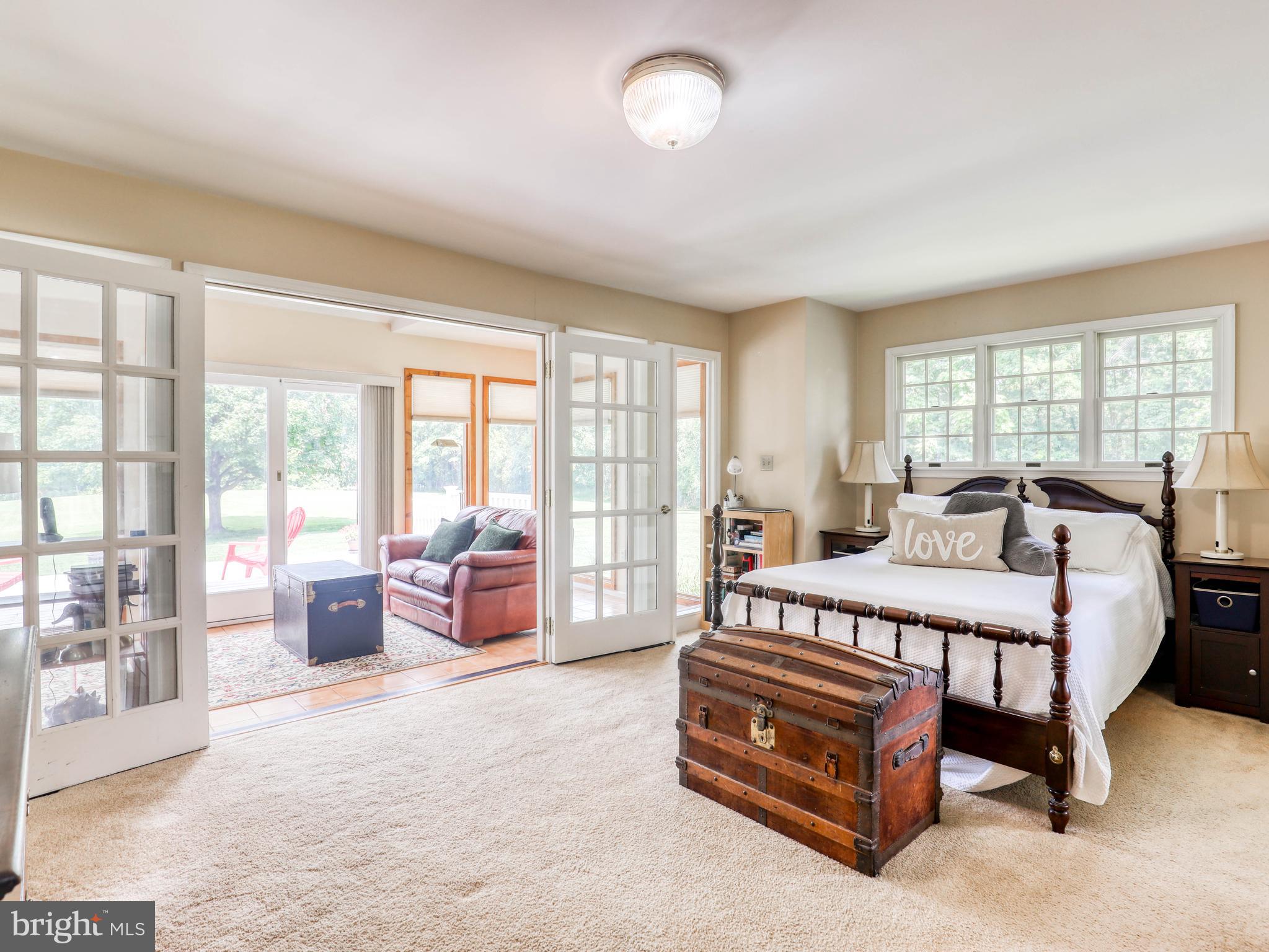3615 Apple Pie Ridge Road Winchester, VA 22603 - Photo 27 of 47 First floor primary bedroom w/access to sunroom