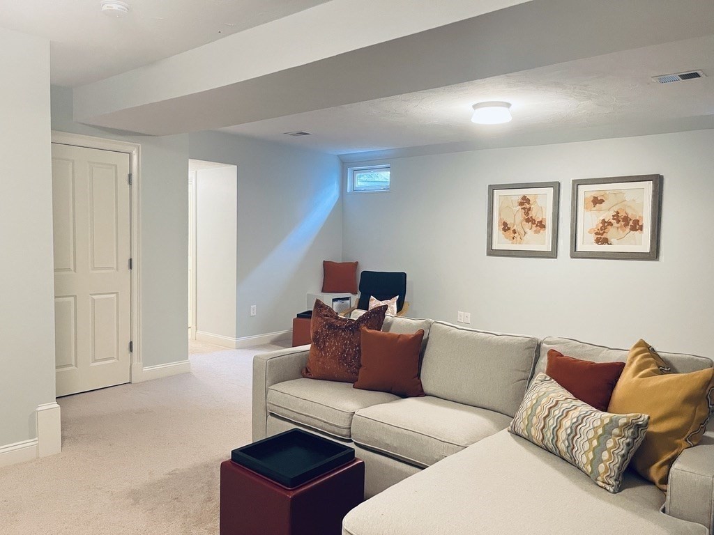 8 Cragmore Road, Unit 8 Newton, MA 02464 - Photo 22 of 27 a living room with furniture