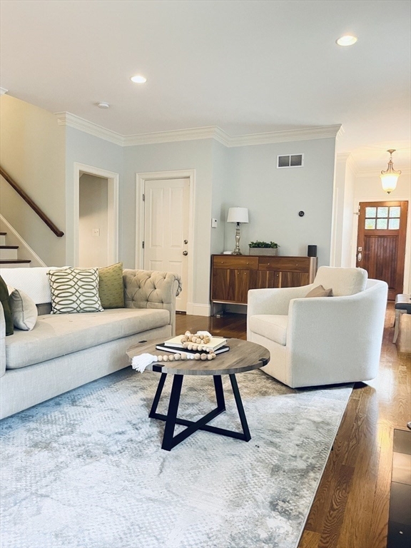 8 Cragmore Road, Unit 8 Newton, MA 02464 - Photo 6 of 27 a living room with furniture and a couch