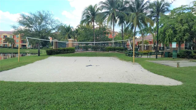 a swimming pool with outdoor seating yard and barbeque oven