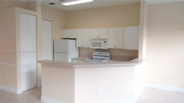 a bathroom with a sink and a window