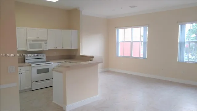 a close up of a sink and a window