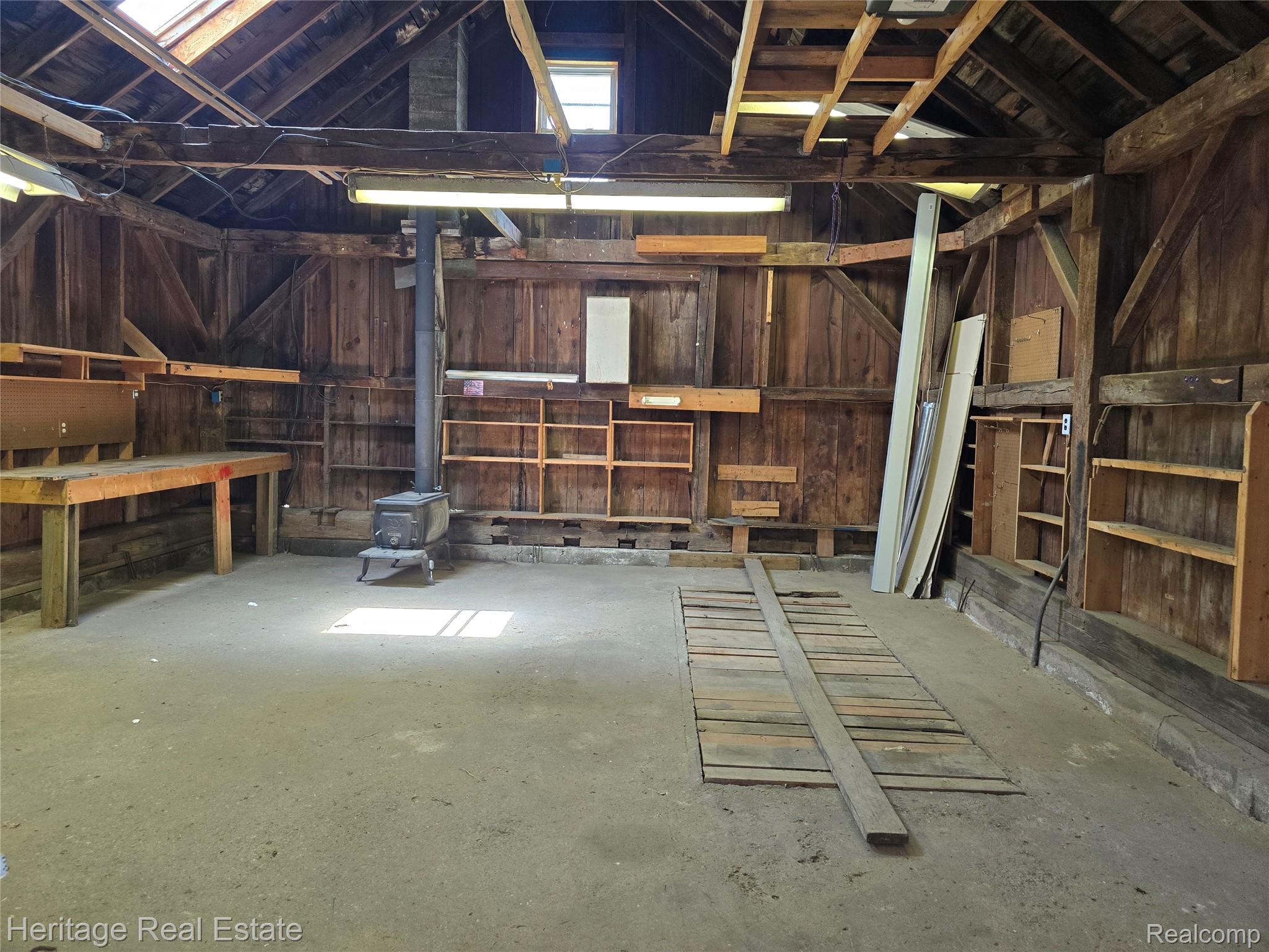 4694 Herd Road Metamora, MI 48455 - Photo 41 of 59 Inside of garage 220 electric and pit for car repairs