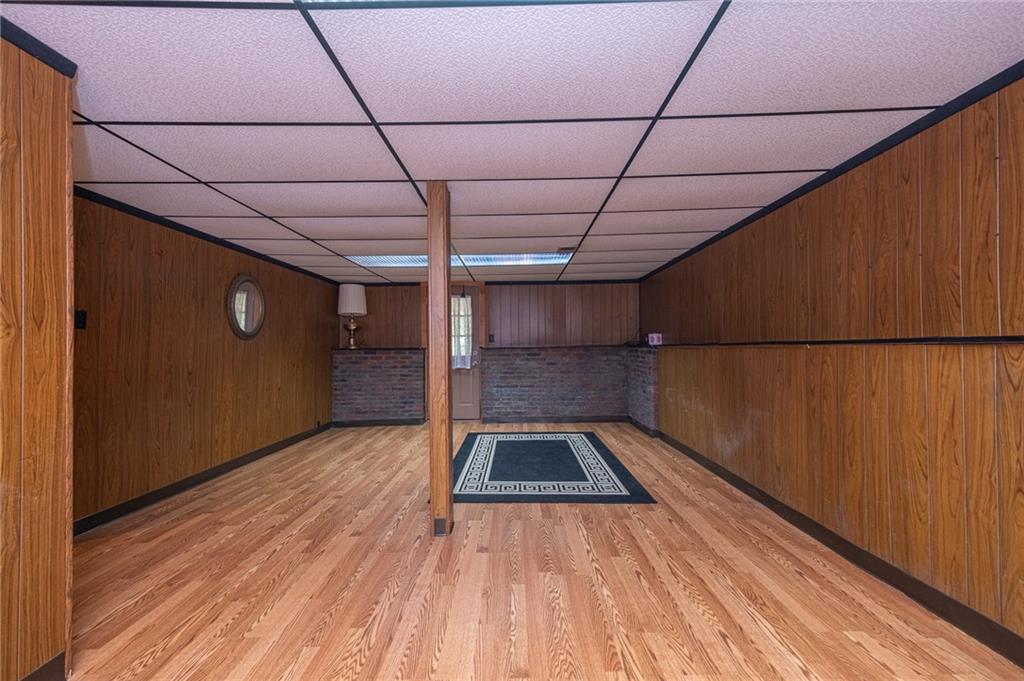 1310 Greenhill Rd Extension Pittsburgh, PA 15209 - Photo 24 of 39 a view of a hallway with wooden floor