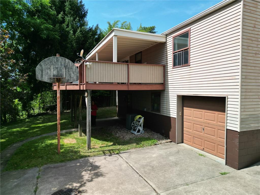 1310 Greenhill Rd Extension Pittsburgh, PA 15209 - Photo 32 of 39 a house view with a backyard space