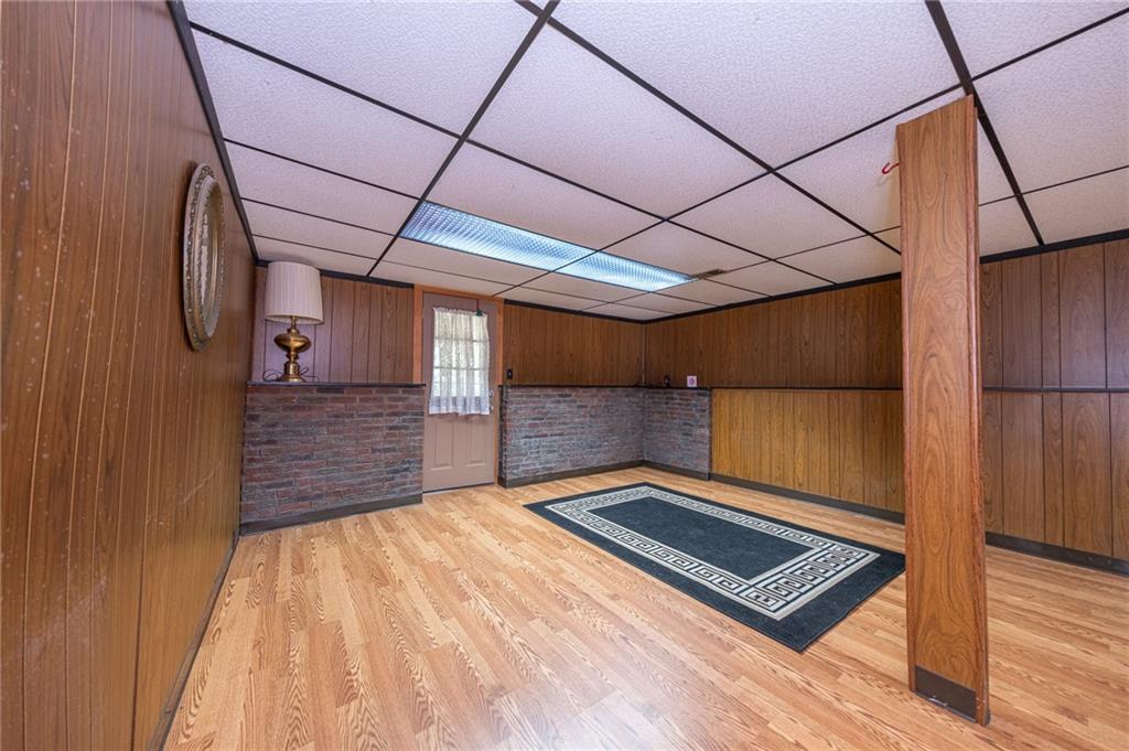 1310 Greenhill Rd Extension Pittsburgh, PA 15209 - Photo 7 of 39 a view of a hallway with wooden floor