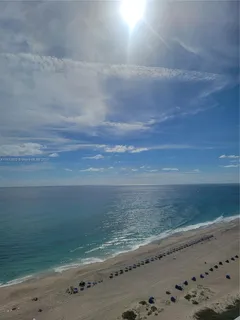 a view of beach and ocean