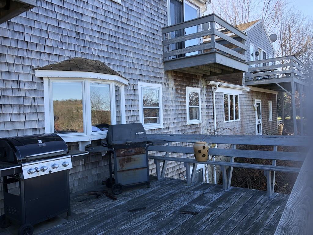 25 Long Boat Road Bourne, MA 02532 - Photo 2 of 23 a view of house with outdoor space and seating area