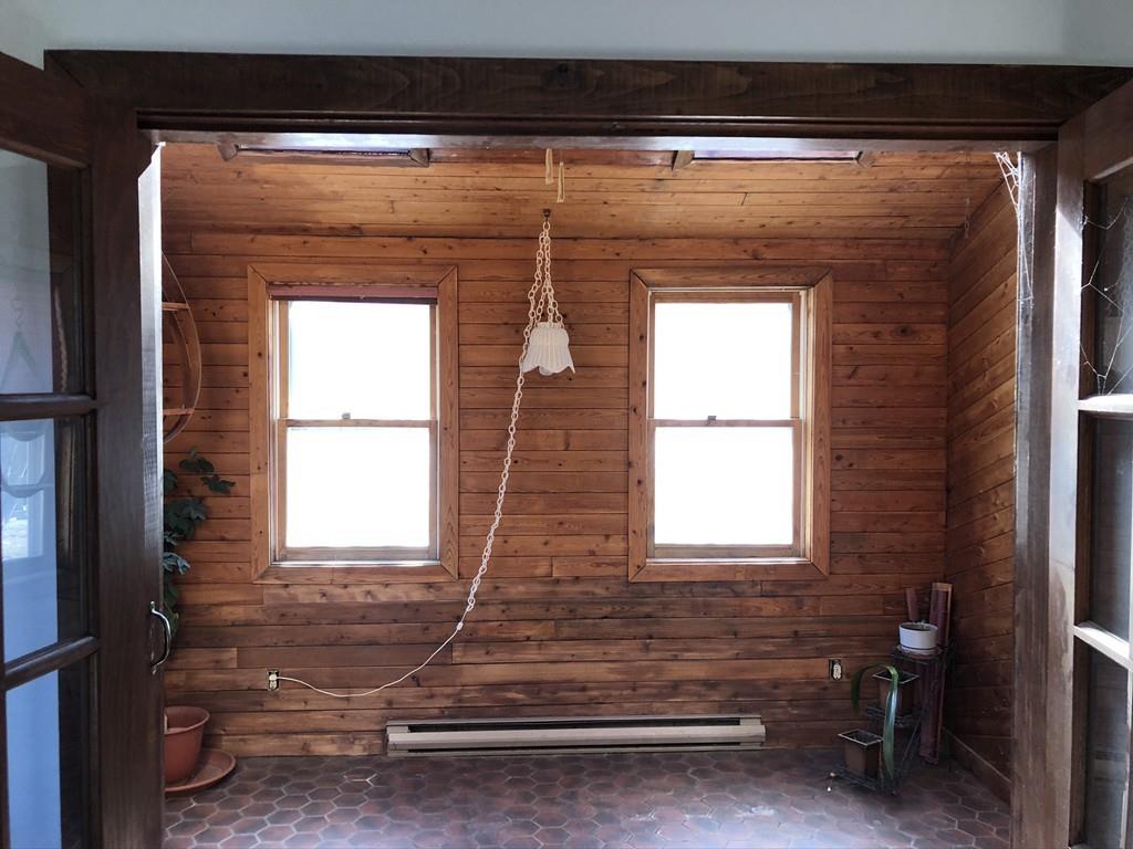 25 Long Boat Road Bourne, MA 02532 - Photo 5 of 23 a front view of a house with a window