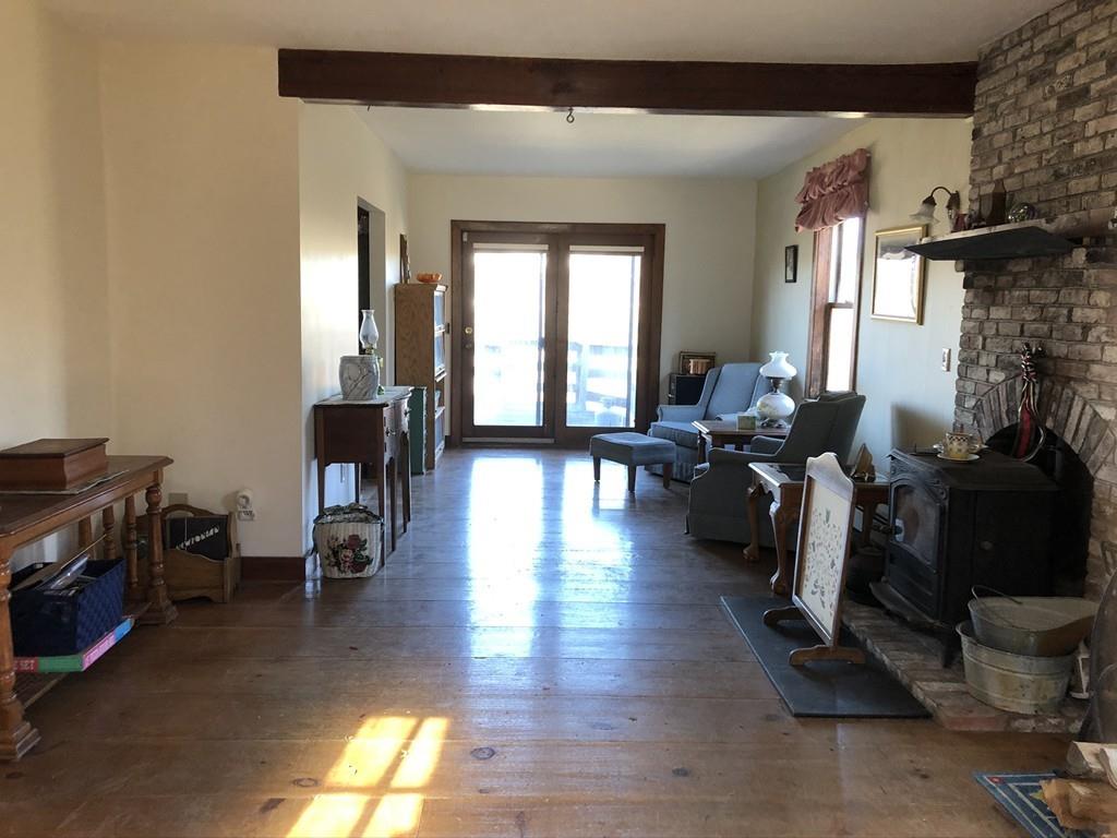 25 Long Boat Road Bourne, MA 02532 - Photo 6 of 23 a living room with furniture window and wooden floor