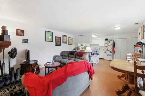 a view of hallway with livingroom and furniture
