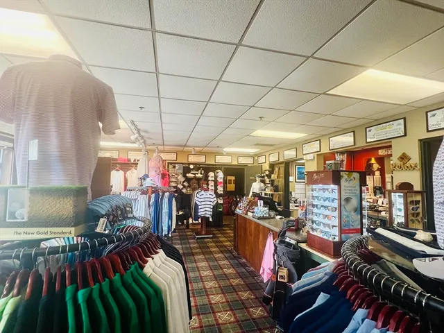 a view of a chairs and tables in a room