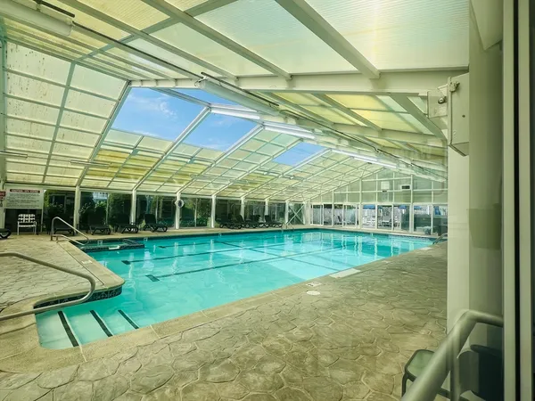 a view of a backyard with a table and chair