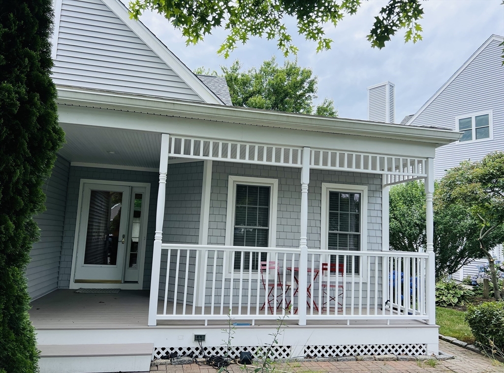 619 White Cliffs Drive, Unit 619 Plymouth, MA 02360 - Photo 41 of 42 a view of a house with a porch