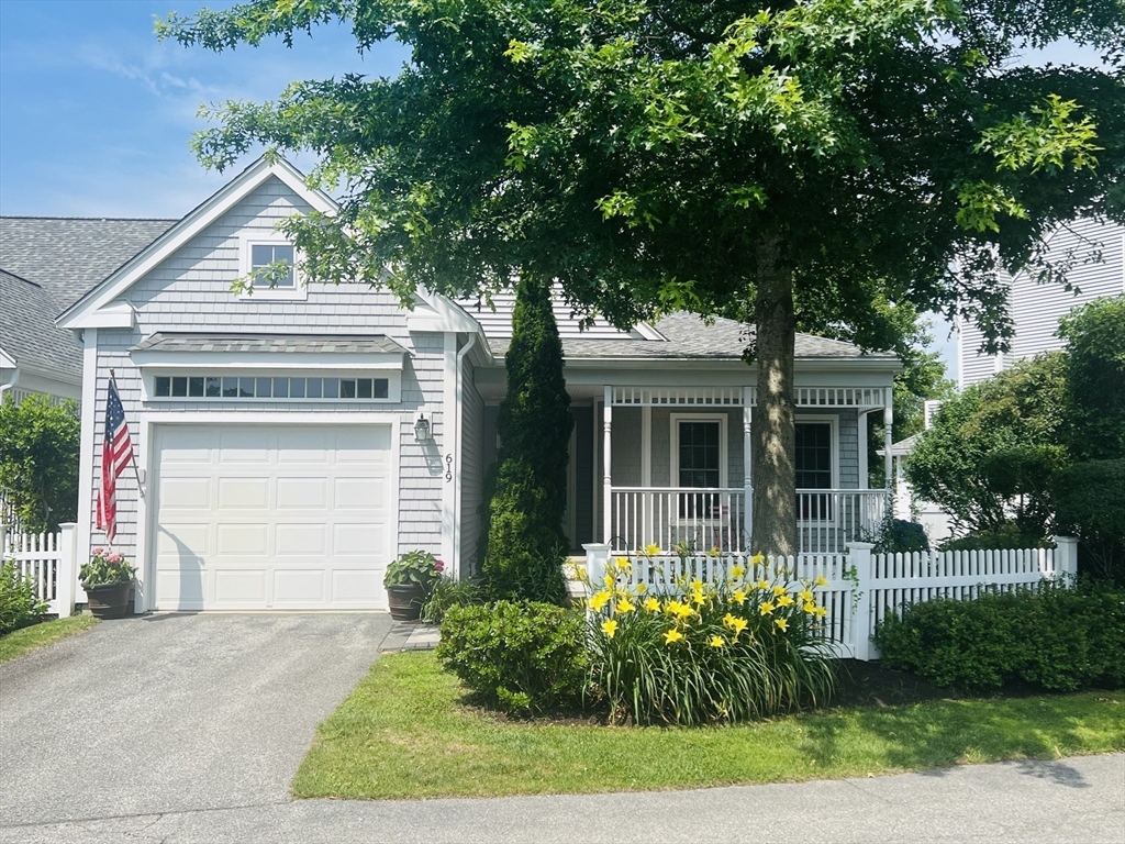 619 White Cliffs Drive, Unit 619 Plymouth, MA 02360 - Photo 42 of 42 a front view of a house with garden