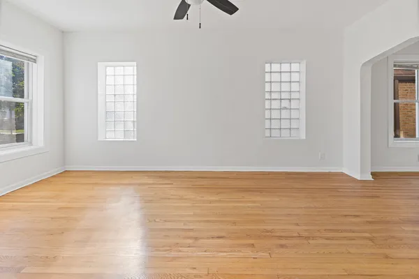 a view of an empty room with a window