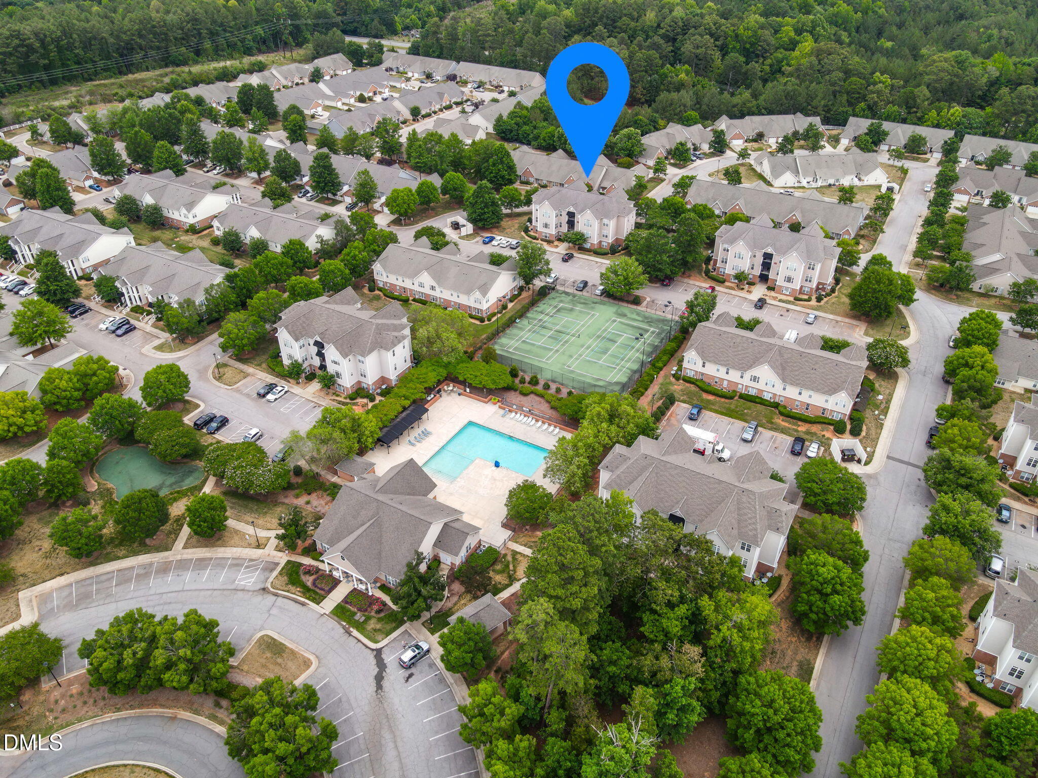 2501 Huntscroft Lane, Unit 100 Raleigh, NC 27617 - Photo 4 of 31 an aerial view of a house with a swimming pool
