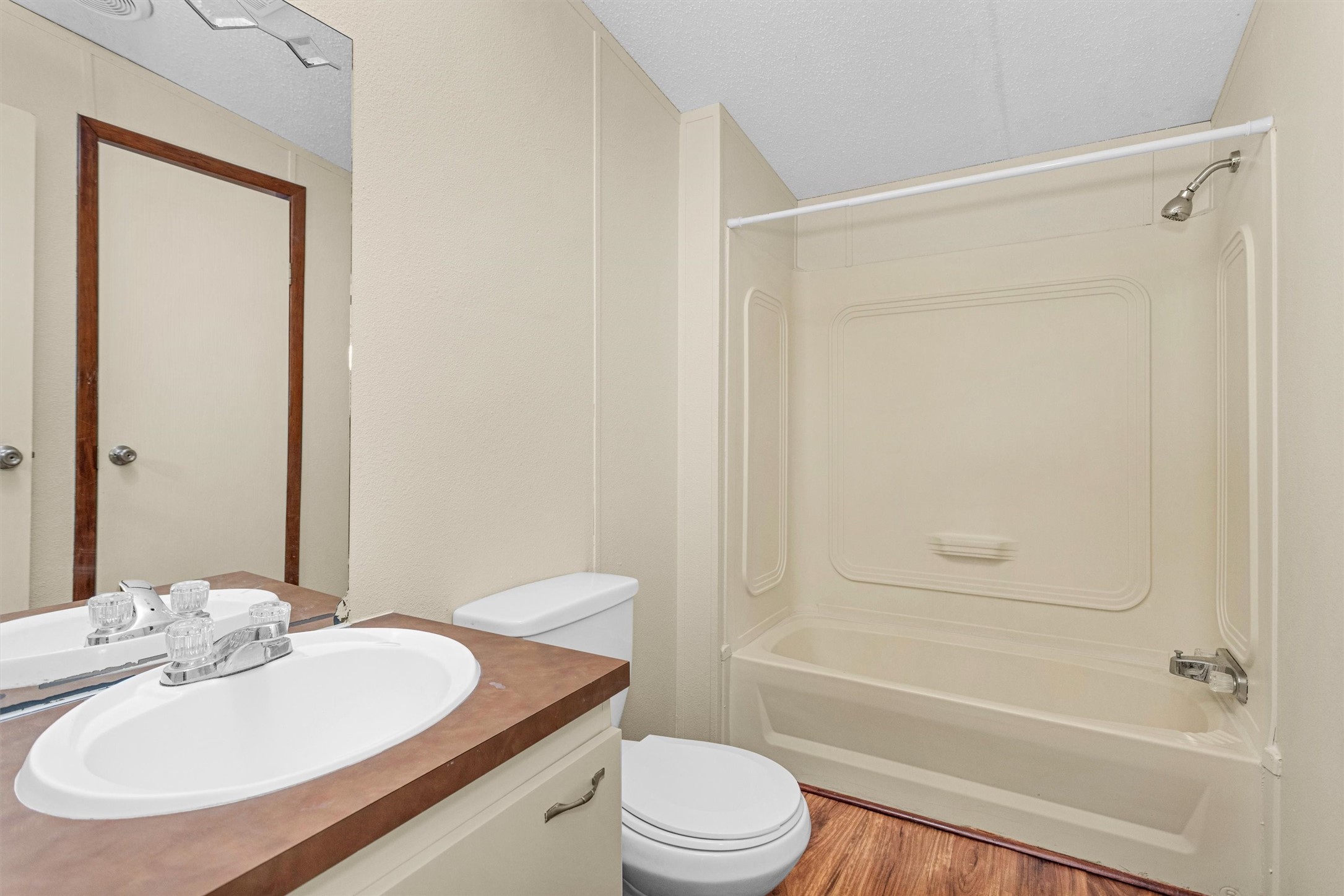 11261 Rose Road Conroe, TX 77303 - Photo 24 of 30 a bathroom with a sink toilet and shower