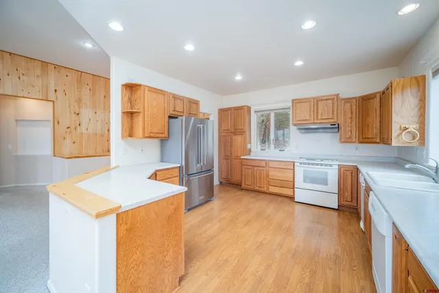 a view of balcony with wooden floor