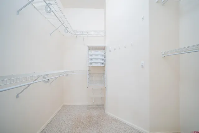 a white bath tub sitting next to a window