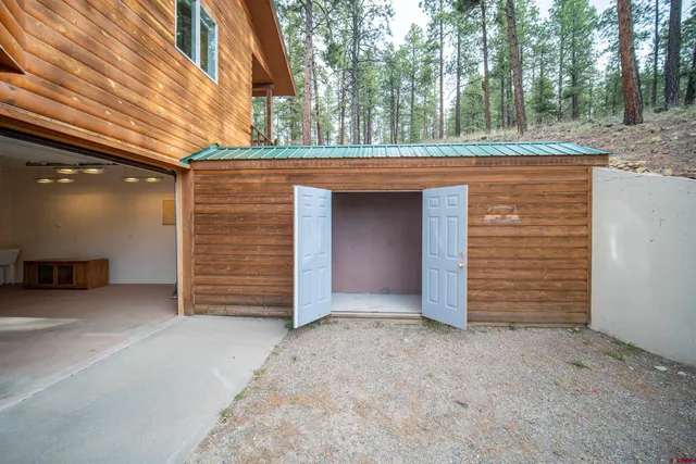 a aerial view of a house with a yard