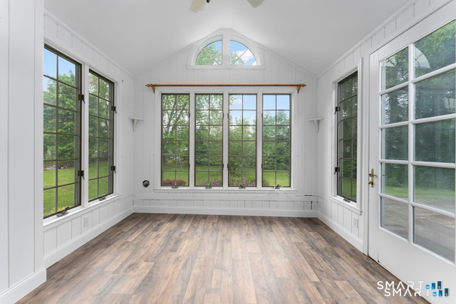 62 Chatham Road Berlin, CT 06037 - Photo 19 of 38 a view of an empty room with wooden floor and a window