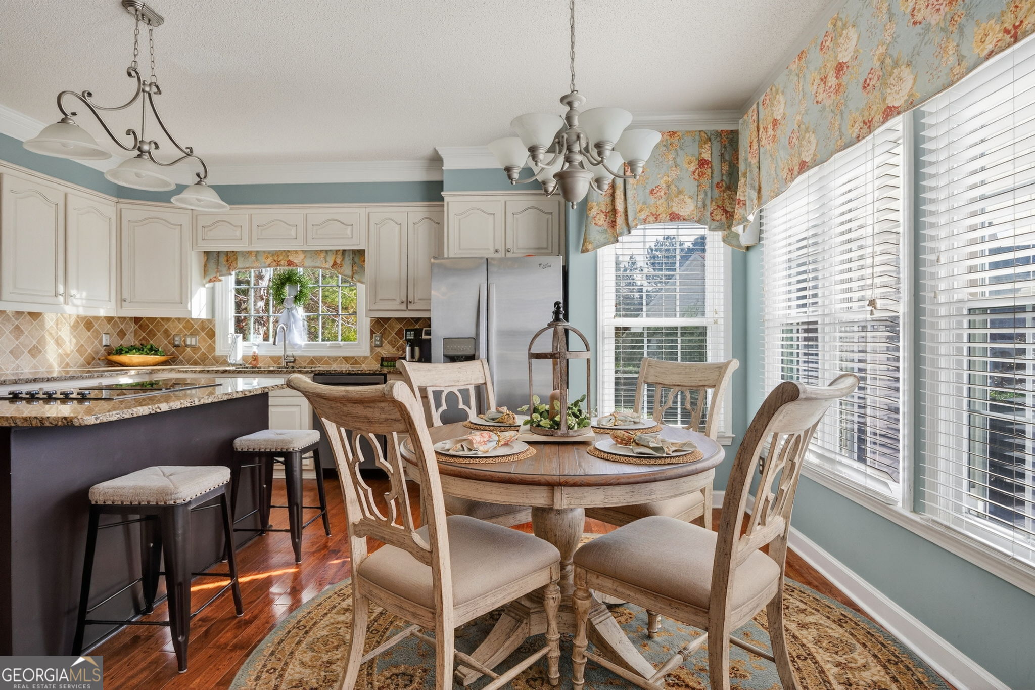 312 Pinnacle Park Macon, GA 31220 - Photo 18 of 63 a dining room with furniture a chandelier and kitchen view
