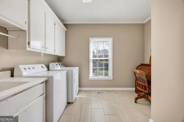a bathroom with a sink and a bathtub