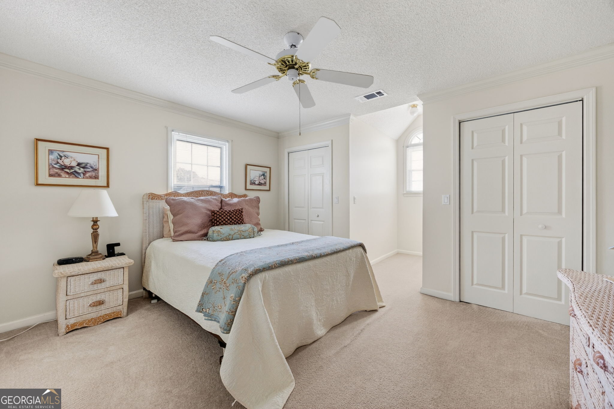 312 Pinnacle Park Macon, GA 31220 - Photo 33 of 63 a bedroom with a bed and a chandelier