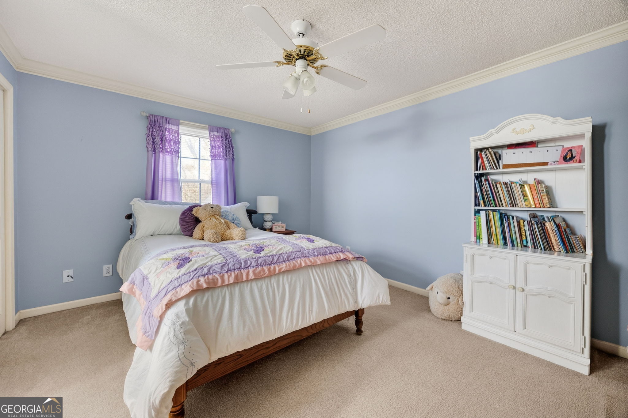 312 Pinnacle Park Macon, GA 31220 - Photo 38 of 63 a bedroom with a bed table and a book shelf