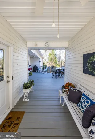 a view of outdoor space with deck and tree