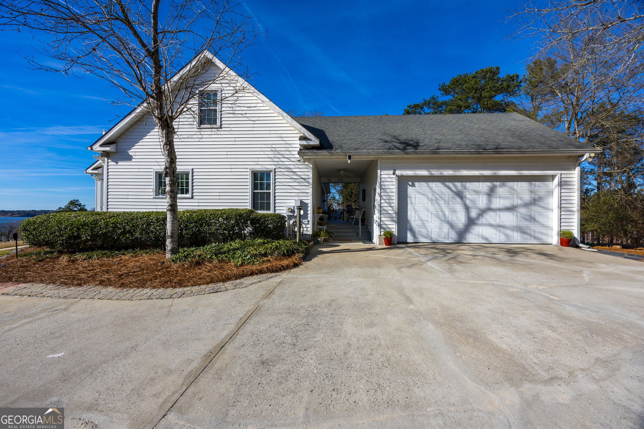 312 Pinnacle Park Macon, GA 31220 - Photo 60 of 63 a view of a white house with a yard