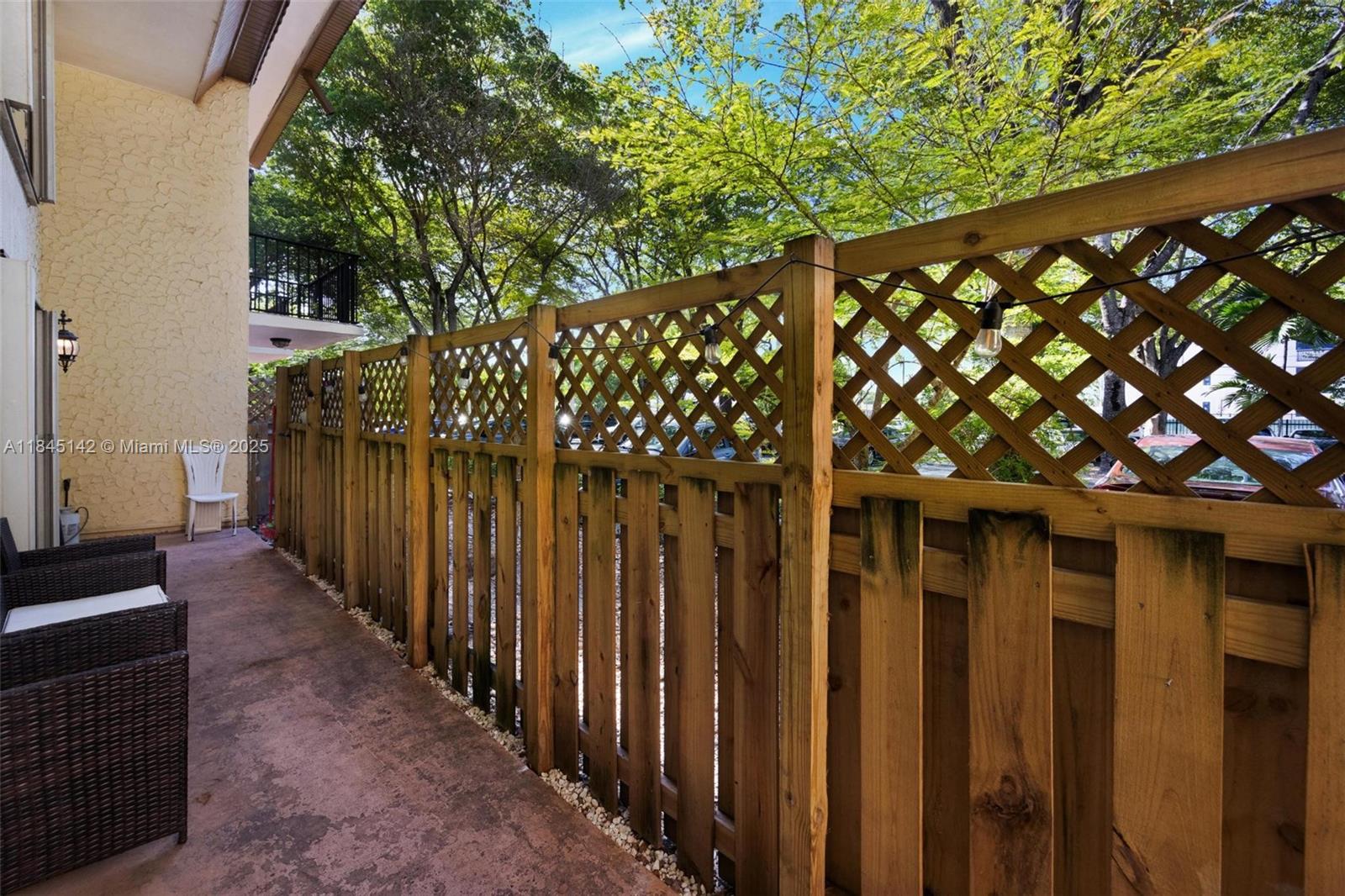 8500 Southwest 109th Avenue, Unit 6112 Miami, FL 33173 - Photo 15 of 52 a view of a wooden fence