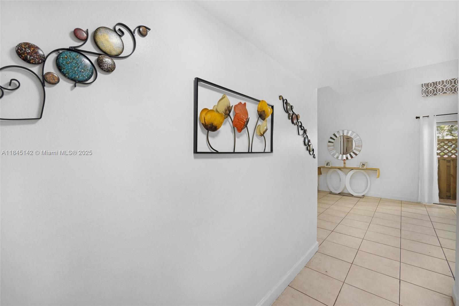 8500 Southwest 109th Avenue, Unit 6112 Miami, FL 33173 - Photo 2 of 52 a view of a hallway with painted walls