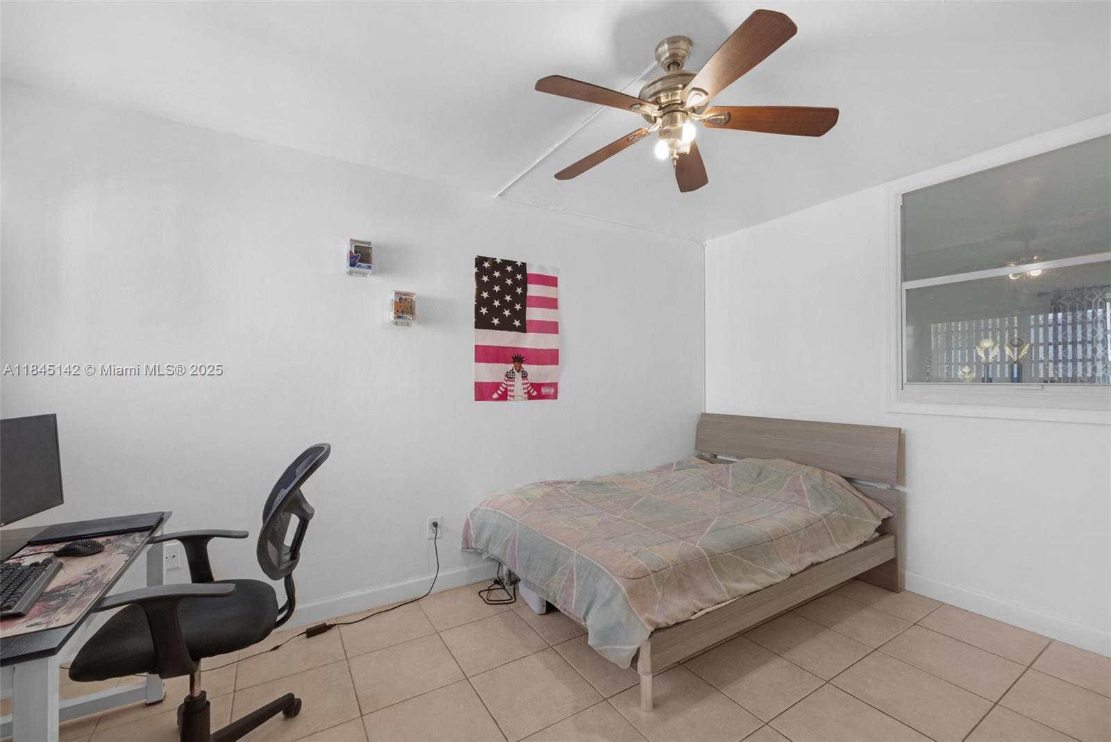 8500 Southwest 109th Avenue, Unit 6112 Miami, FL 33173 - Photo 30 of 52 a bedroom with a bed furniture and a window