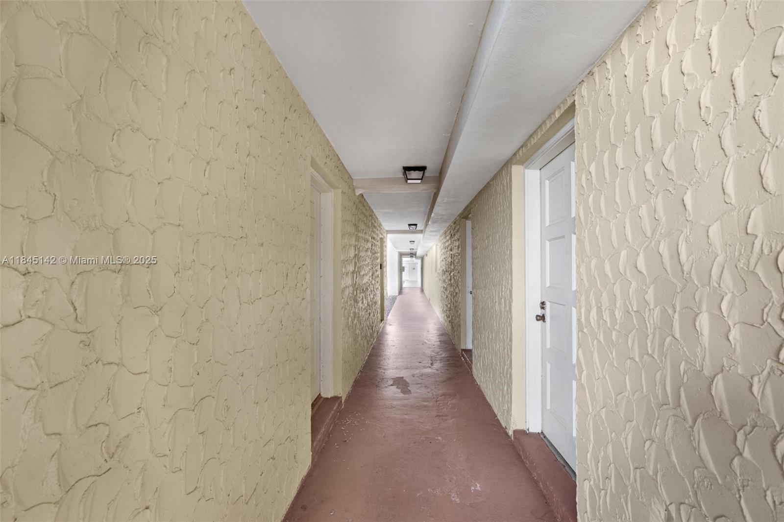 8500 Southwest 109th Avenue, Unit 6112 Miami, FL 33173 - Photo 34 of 52 a view of a hallway with wooden floor and staircase