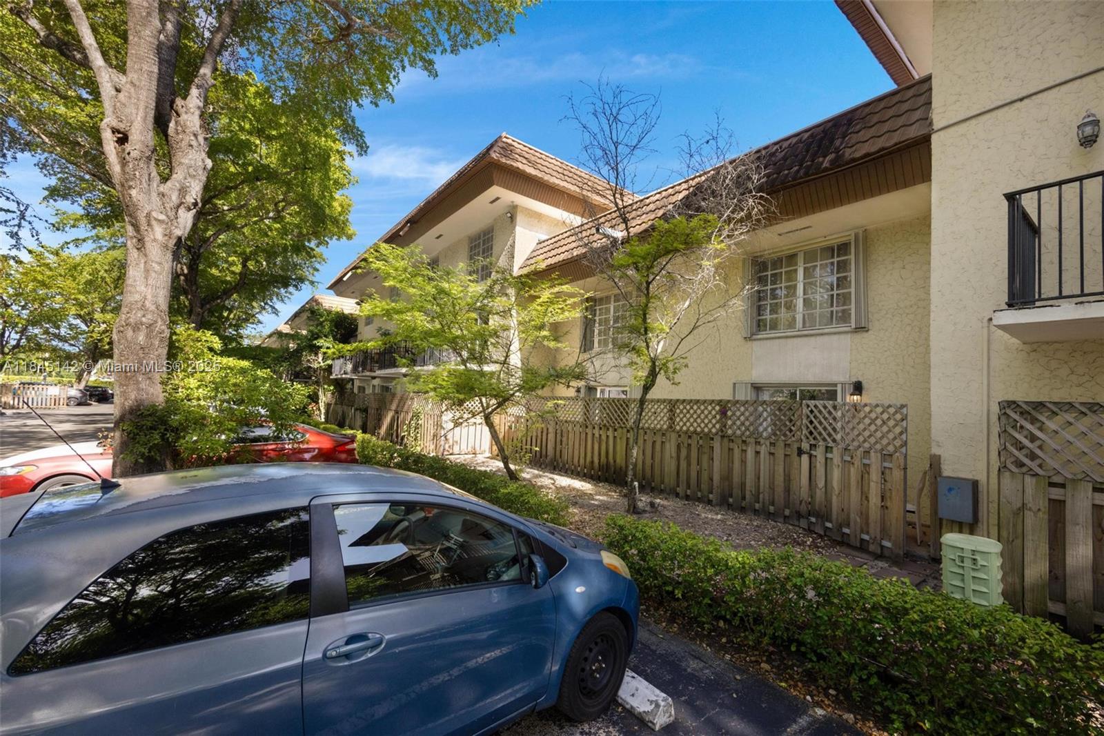 8500 Southwest 109th Avenue, Unit 6112 Miami, FL 33173 - Photo 36 of 52 a view of a car park in front of a house