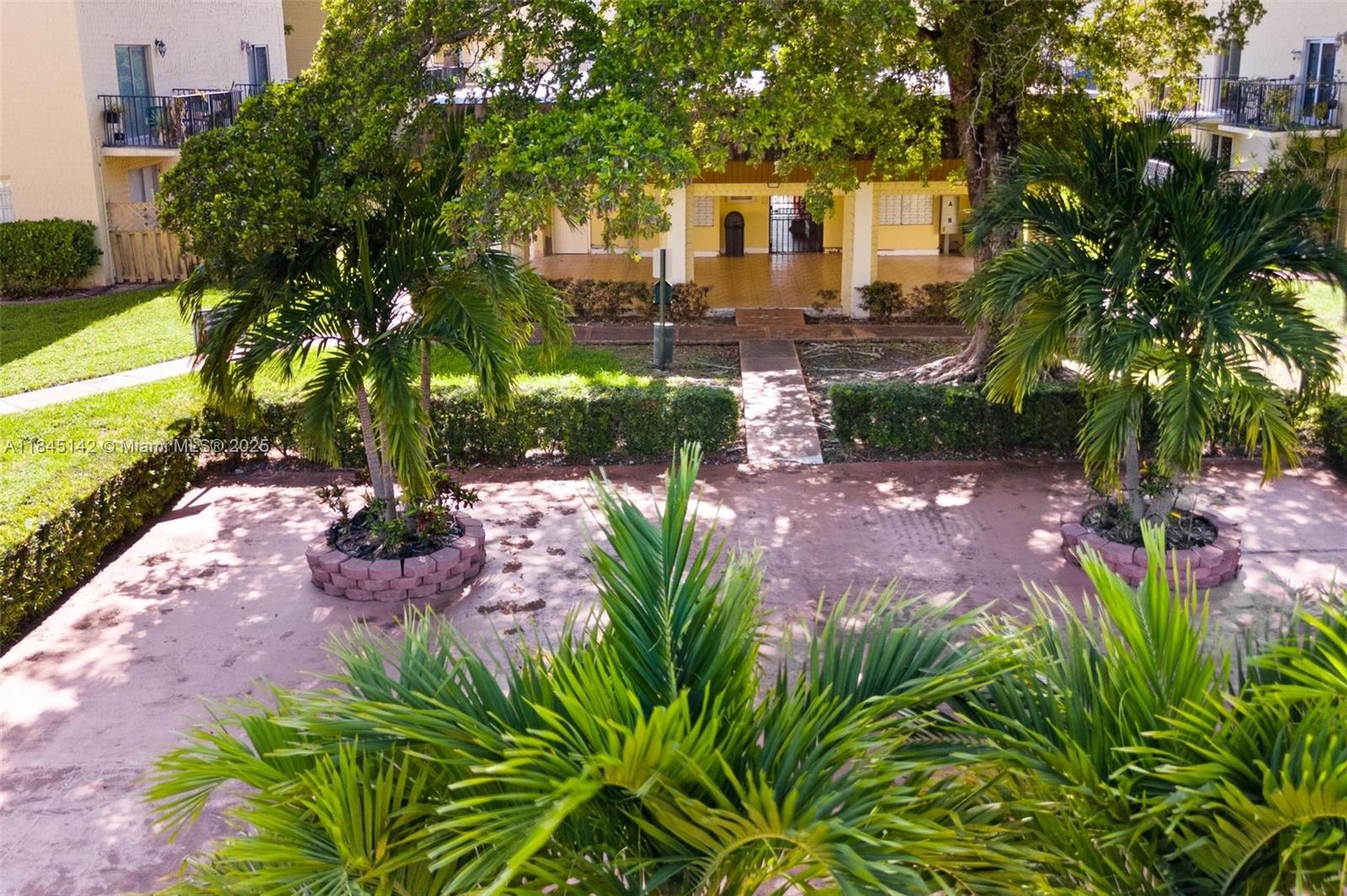 8500 Southwest 109th Avenue, Unit 6112 Miami, FL 33173 - Photo 40 of 52 a view of a house with a yard