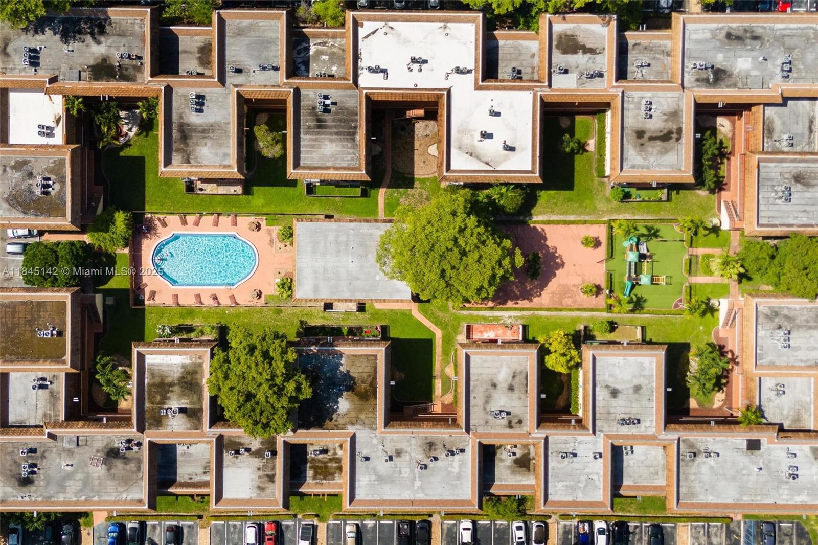 8500 Southwest 109th Avenue, Unit 6112 Miami, FL 33173 - Photo 43 of 52 an aerial view of residential houses with outdoor space and street view