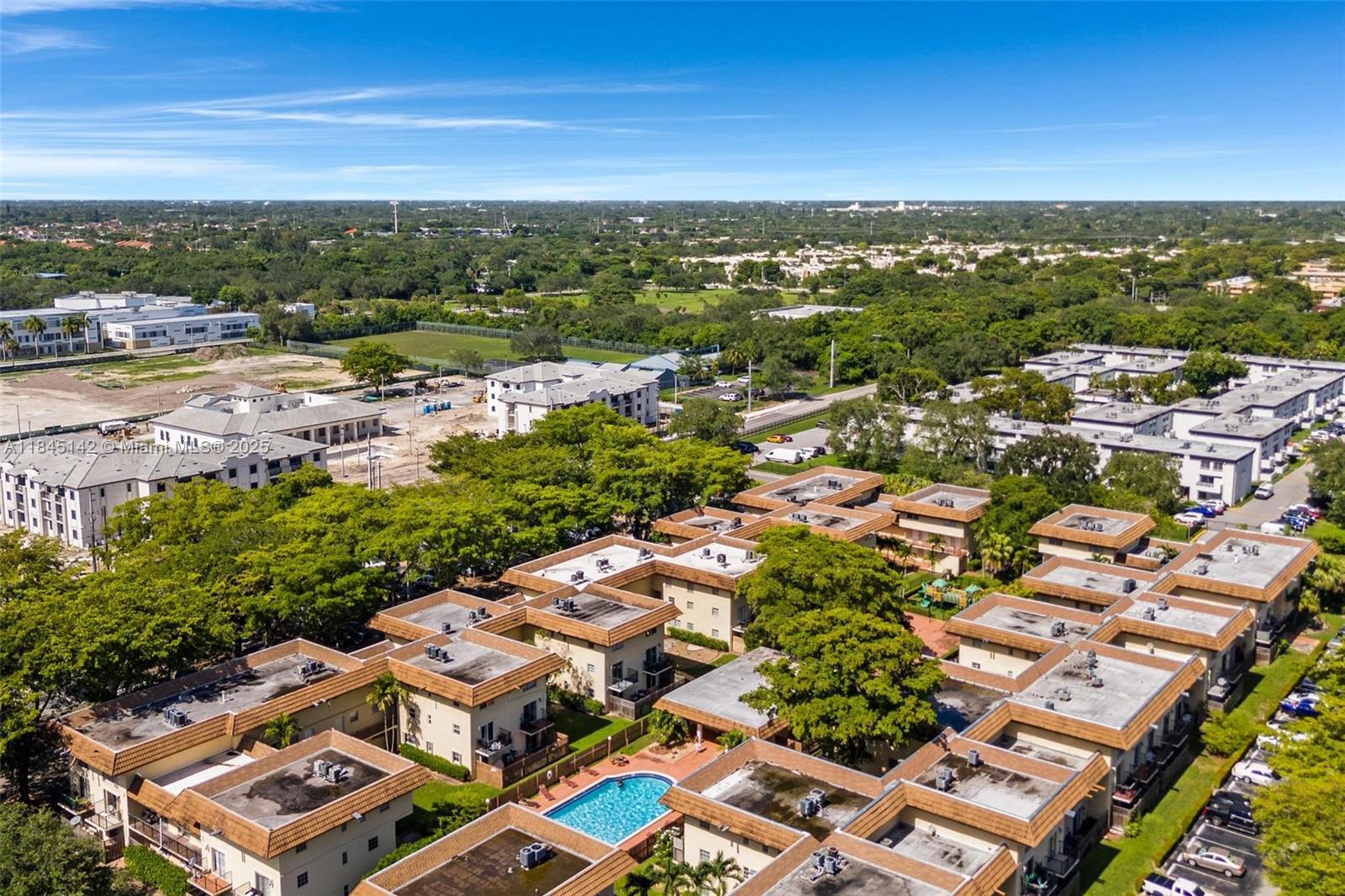 8500 Southwest 109th Avenue, Unit 6112 Miami, FL 33173 - Photo 44 of 52 an aerial view of residential houses with outdoor space