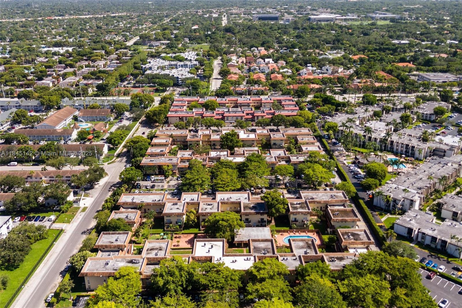 8500 Southwest 109th Avenue, Unit 6112 Miami, FL 33173 - Photo 51 of 52 an aerial view of residential houses with city view