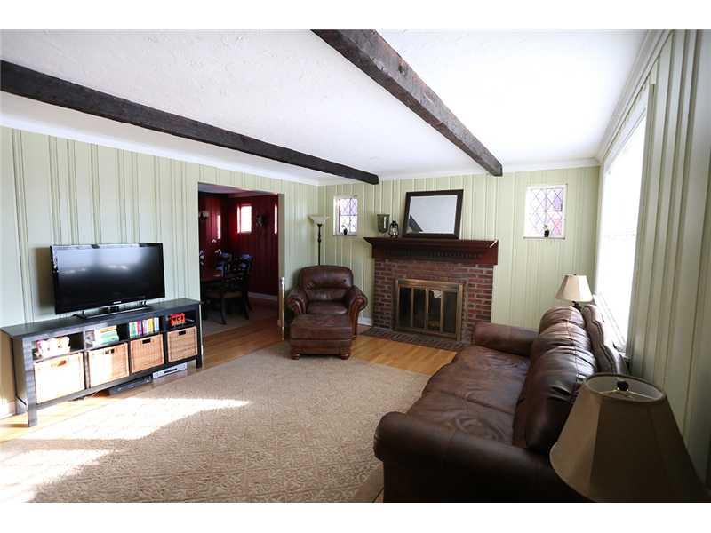 335 Marshall Road Bethel Park, PA 15102 - Photo 2 of 25 Living Room. Lots of natural sunlight greet you in the living room. The room features hardwood floors, beamed ceilings, and a log burning fireplace.