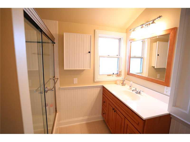 335 Marshall Road Bethel Park, PA 15102 - Photo 15 of 25 Master Bath/Spa. The master bath has been remodeled with vanity, ceramic tile floor and tub. The bead board flows with the age and charm of the home.