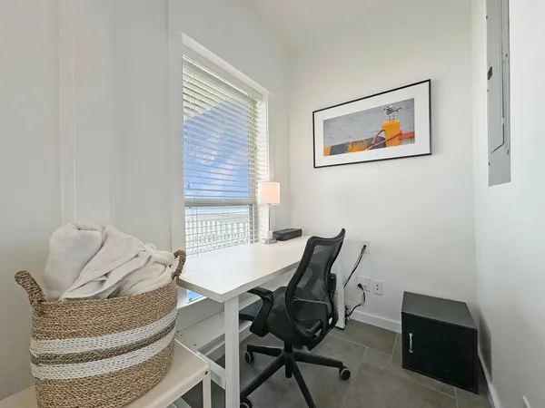 a view of a livingroom with furniture